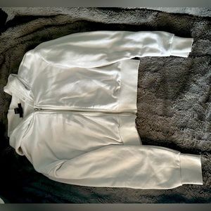 Cropped White Zip Up. Forever 21. Missing draw string.